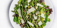 Asparagus, smashed boiled egg and hazelnut salad